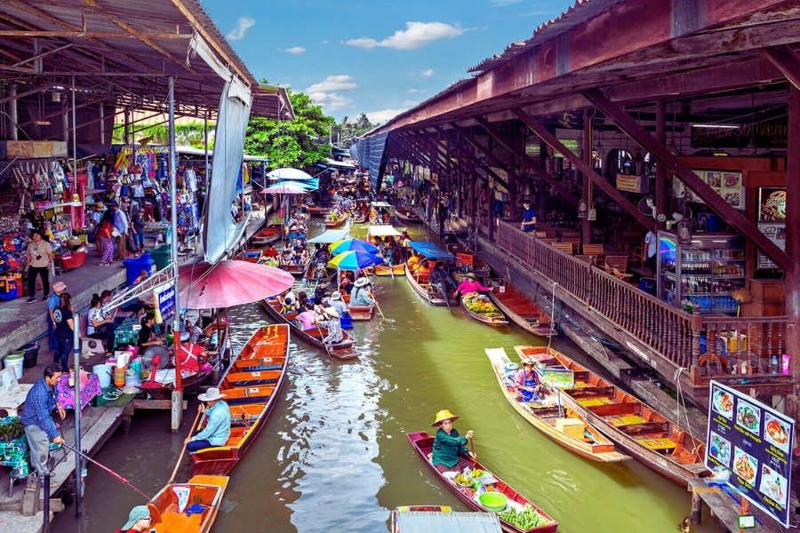 Damnoen Saduak Floating Market with colorful boats in Thailand – Auasia Travel